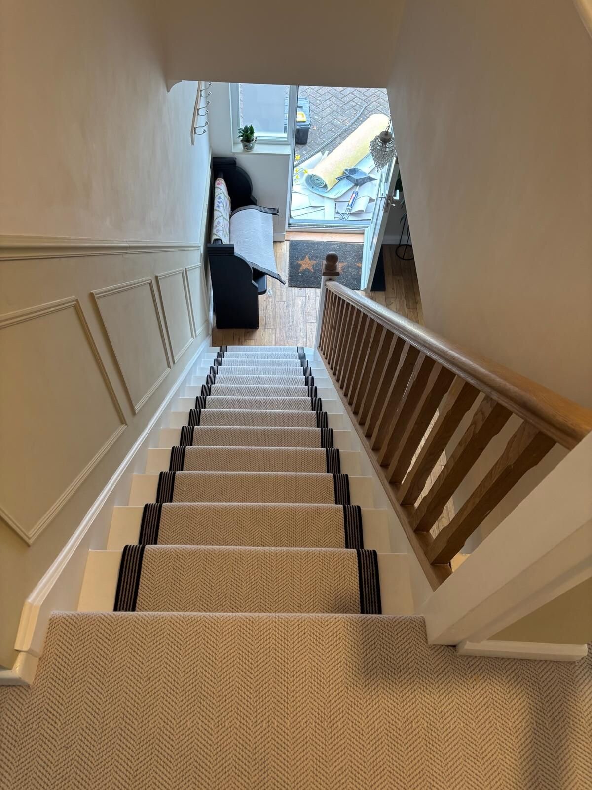 Chartwell Fibre Wool Herringbone stairs with pewter stair rods